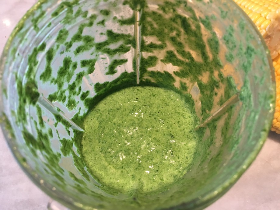 Corn soup with wild garlic cream